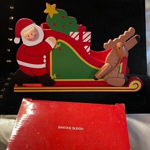 Avon Vintage Collectible Wood “Santa’s Sleigh” Open in Center.